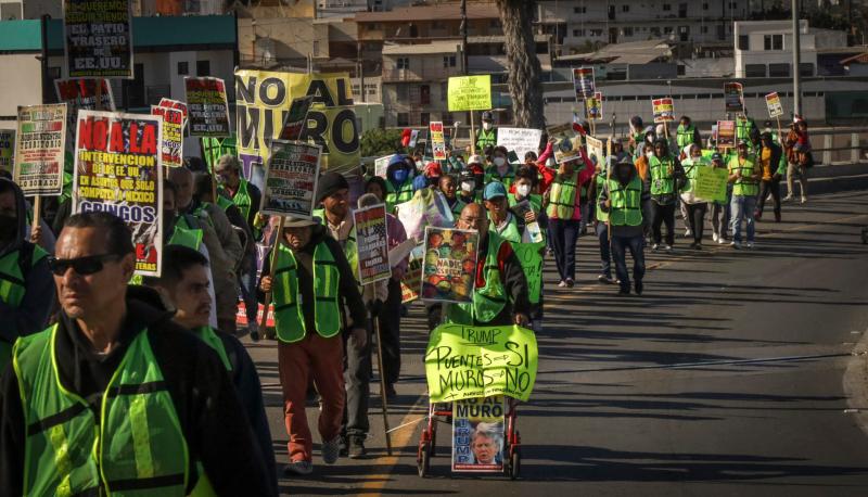 Migrantes protestan en Tijuana contra amenazas de Trump - 90b068465de6c12694302e7ad7734534226ce51cw-1-1024x586